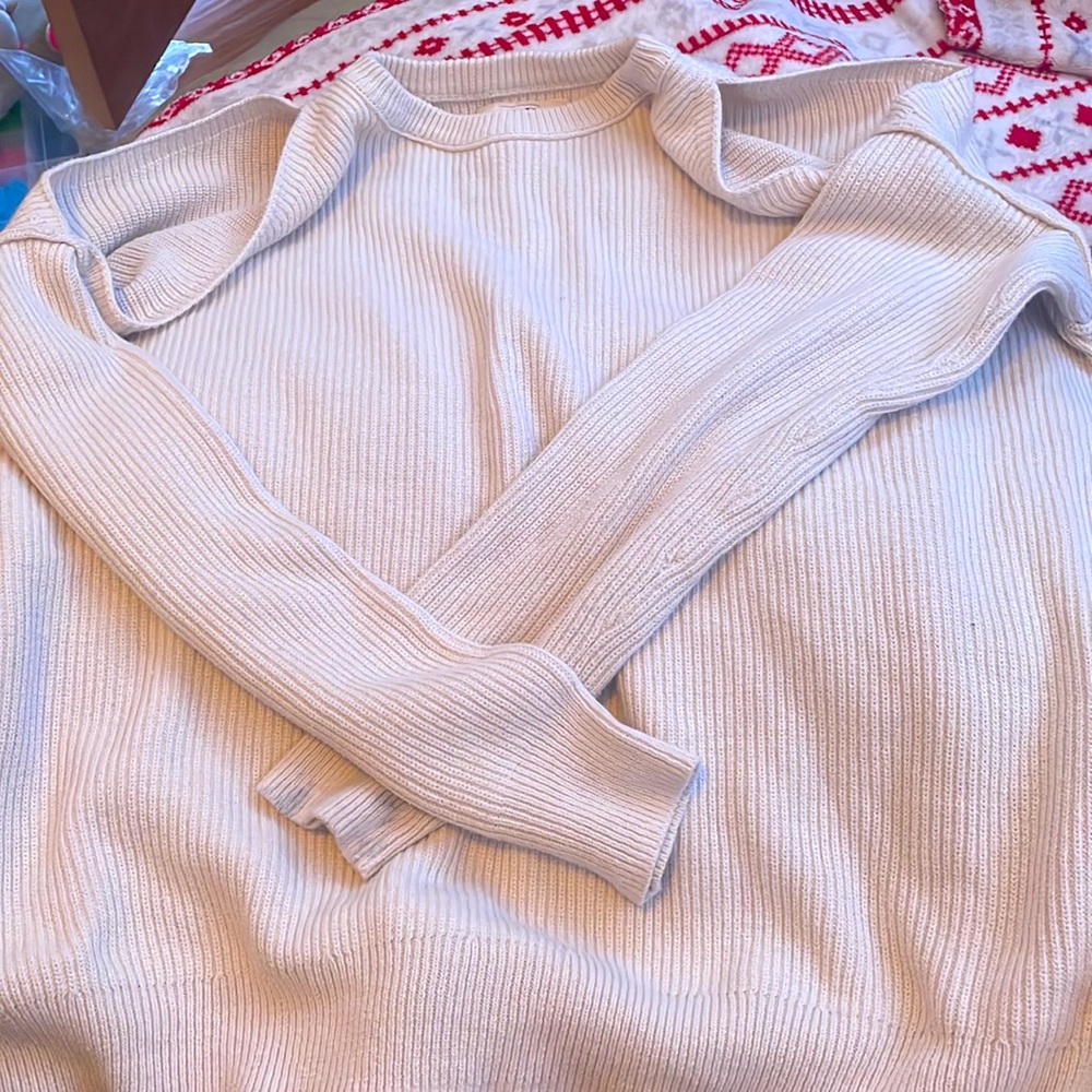 Sweater with holes on shoulders. Hollister and size is small.